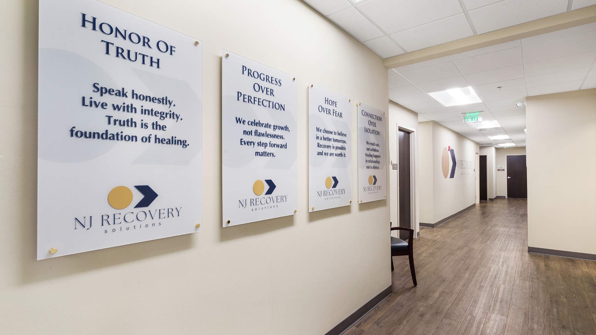 Hallway at a Benzo Rehab in New Jersey featuring inspirational words that reflect values such as integrity and compassionate care