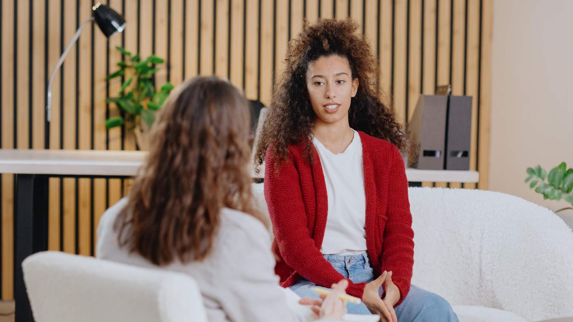 Woman engaged in a guided counseling discussion within a Dual Diagnosis Treatment program in New Jersey