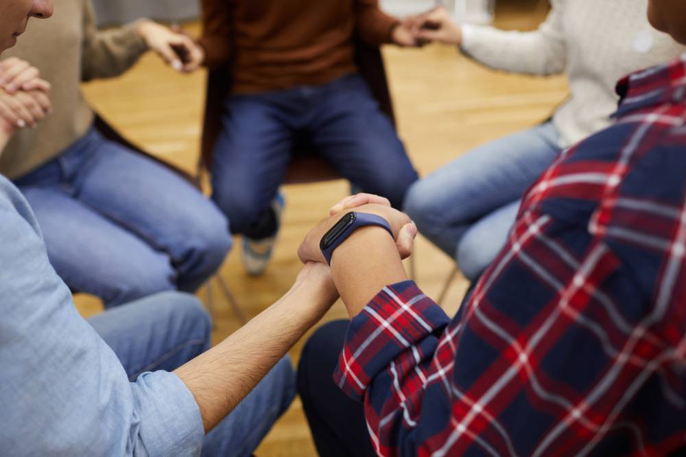 A support group session during Opioid Addiction Treatment in New Jersey, emphasizing community healing and connection in recovery.