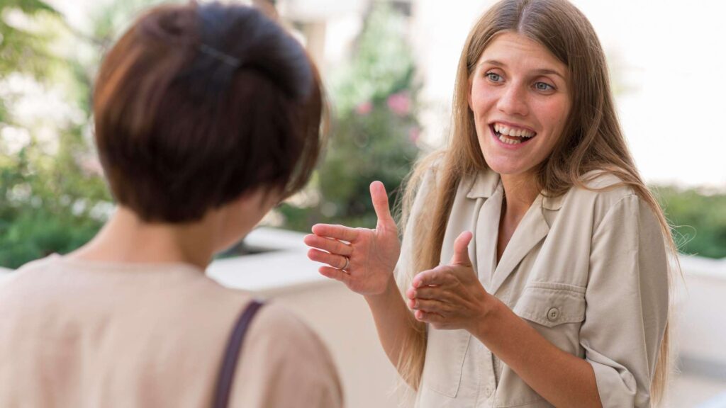 Two women sharing a supportive conversation at The Best Plainfield Rehab in NJ