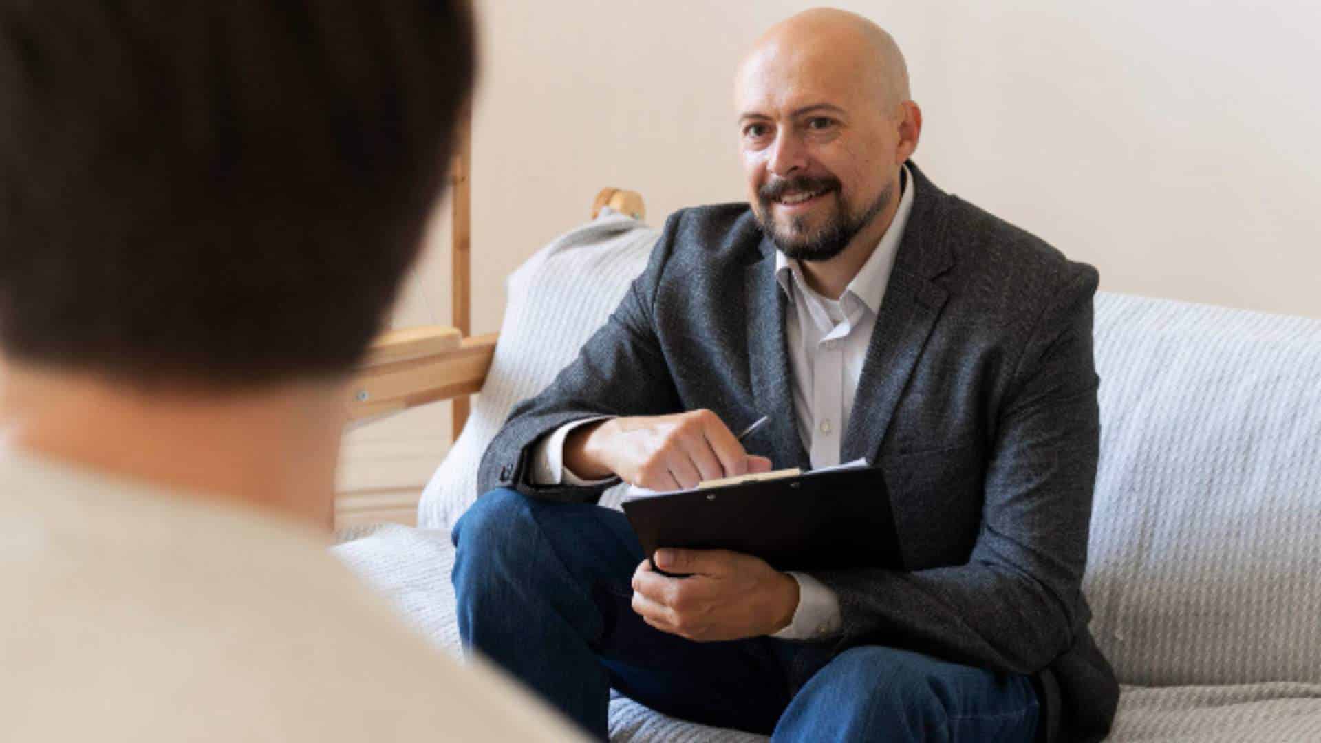 A professional counselor providing guidance and support during a drug rehab session in New Jersey.